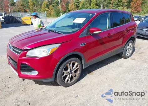 2013 Ford Escape Sel z USA, uszkodzony, nr VIN 1FMCU9H90DUD30210